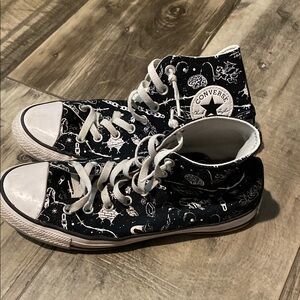 Converse Black and White High-Top Sneakers with Intricate Design